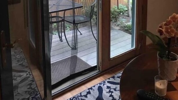 A room with a sliding glass door leading to a patio with a table and chairs. - Cozy quite private Aspen Studio  (Aspen)