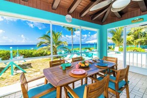 Outdoor dining - Blue Vista Villa - Oceanfront 5 Bedroom Pool Home (Old Man Bay)