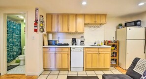 Enjoy cooking in this fully equipped kitchen with a dishwasher, microwave, and coffee maker.