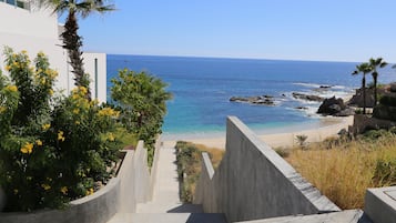 On the beach, sun-loungers, beach towels