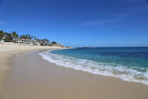 On the beach, sun loungers, beach towels
