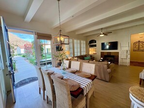 Älytelevisio, takka, DVD-soitin, kirjoja