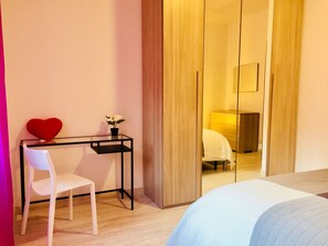 2 habitaciones, tabla de planchar con plancha, wifi y ropa de cama 