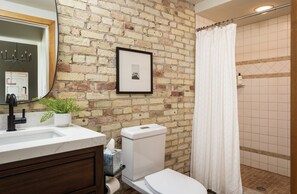 Hair dryer, towels - Historic Hearth · Newly Redesigned Condo in Historic Building (Traverse City)