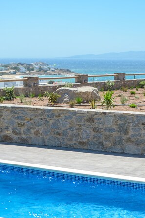 Outdoor pool, open 10:00 AM to 8:00 PM, pool umbrellas, sun loungers