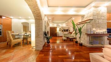 Villa, Private Pool | Living area | Flat-screen TV, fireplace