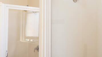 Shower, rainfall showerhead, towels
