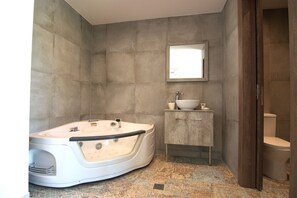 Shower, hair dryer, towels, shampoo