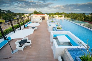Outdoor pool, open 8:00 AM to 9:00 PM, sun loungers