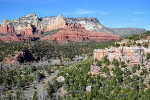 A mountainous landscape with red rock formations and sparse vegetation. - The Lovely House in the Heart of Sedona (Sedona)