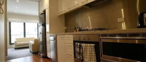 Apartment, 2 Bedrooms | Private kitchen | Full-size fridge, microwave, oven, stovetop