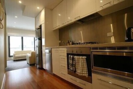 Apartment, 2 Bedrooms | Private kitchen | Full-size fridge, microwave, oven, stovetop