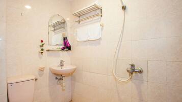 Shower, free toiletries, hair dryer, slippers