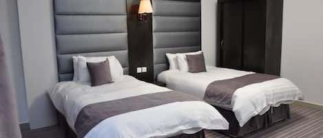 Minibar, coffres-forts dans les chambres, ameublement personnalisé