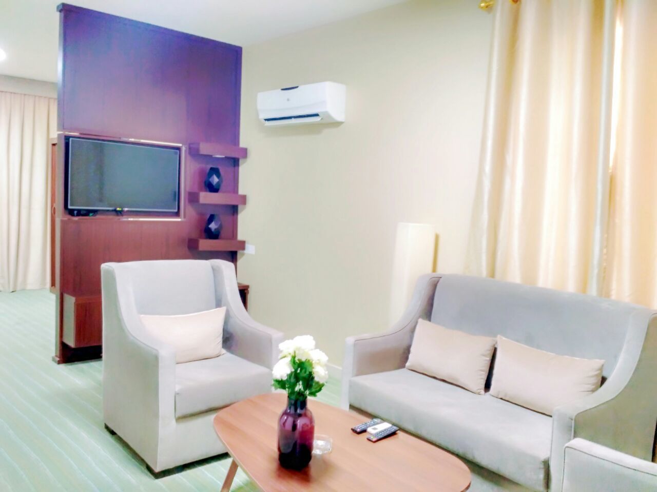 junior suite | living area | 42-inch led tv with satellite channels, tv