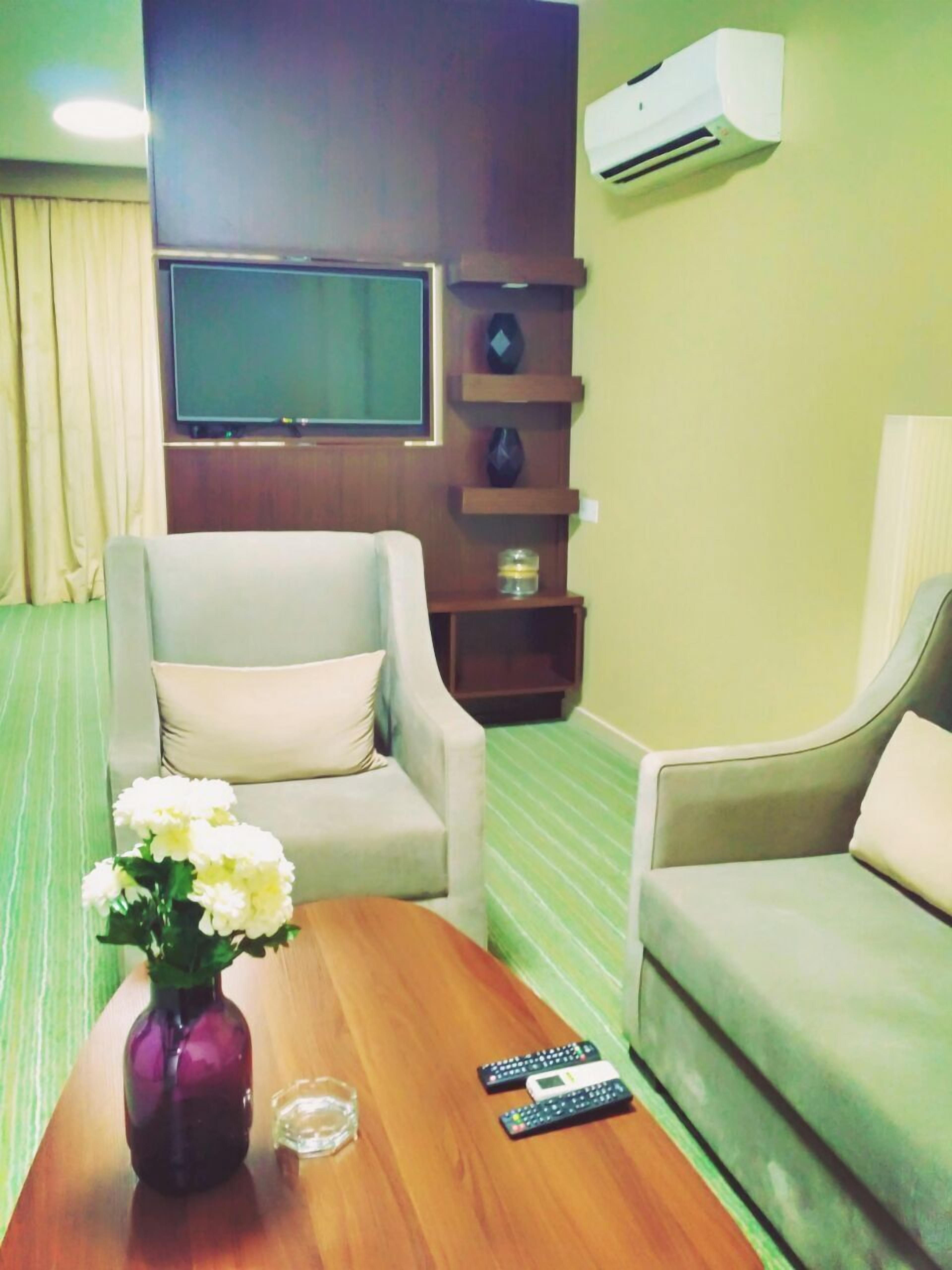 junior suite | living area | 42-inch led tv with satellite channels, tv