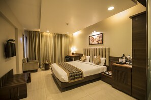 Business Room | Premium bedding, minibar, in-room safe, individually decorated