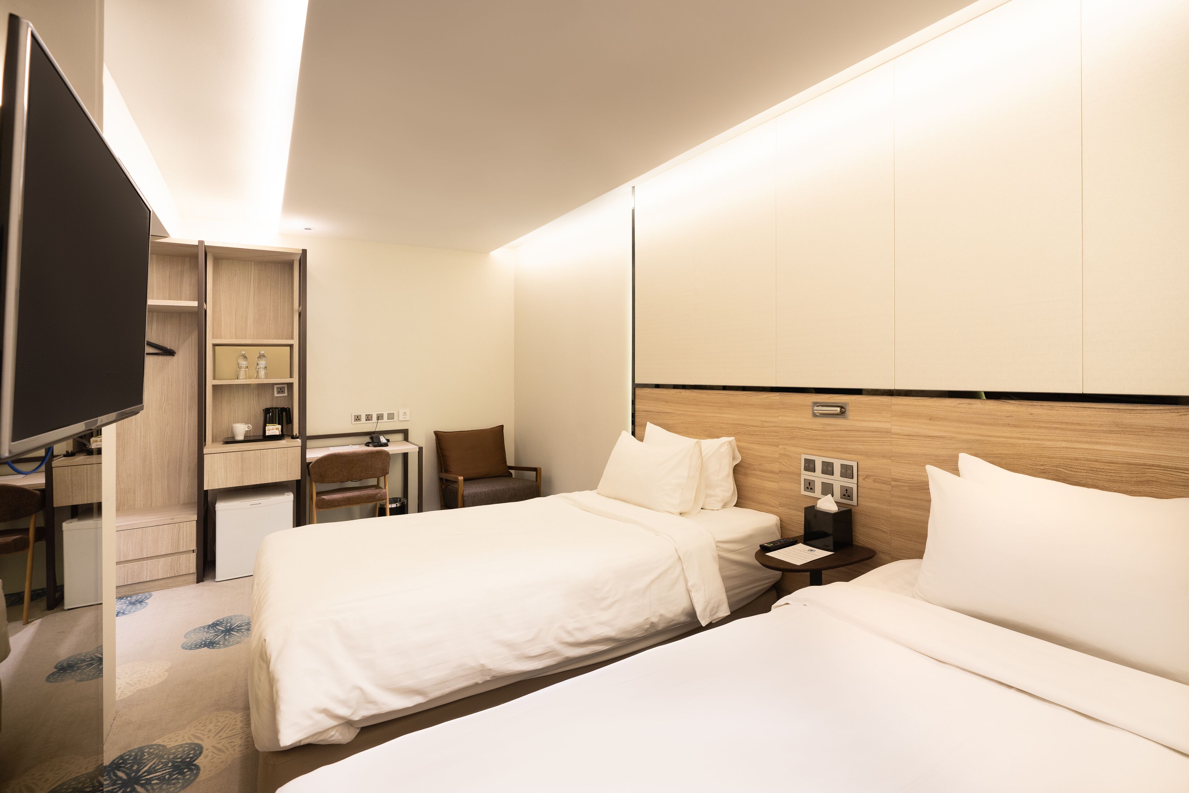 superior twin room without windows | in-room safe, desk, iron/ironing board, free wifi