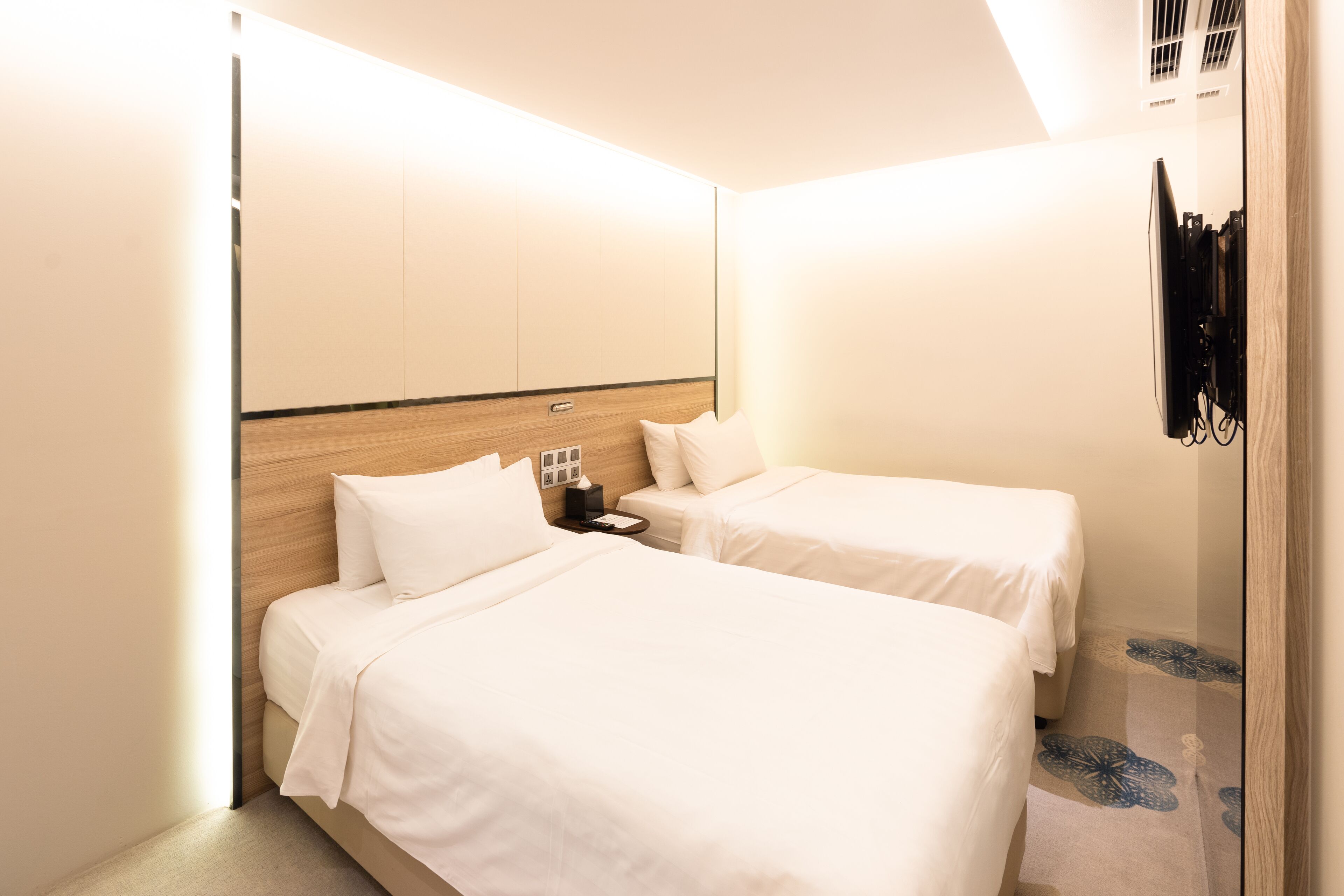 superior twin room without windows | in-room safe, desk, iron/ironing board, free wifi