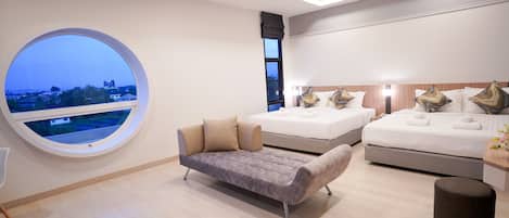 Premier Quadruple Room | Free minibar items, in-room safe, individually decorated, desk