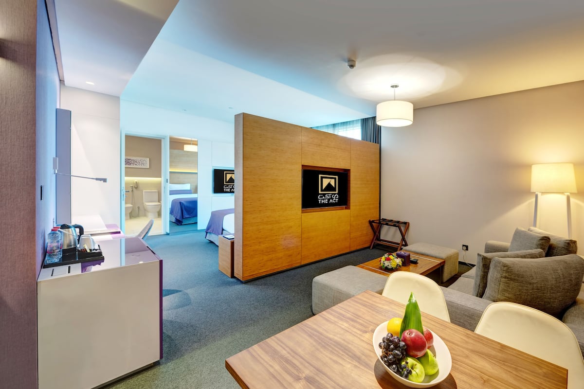 junior suite | living area | flat-screen tv