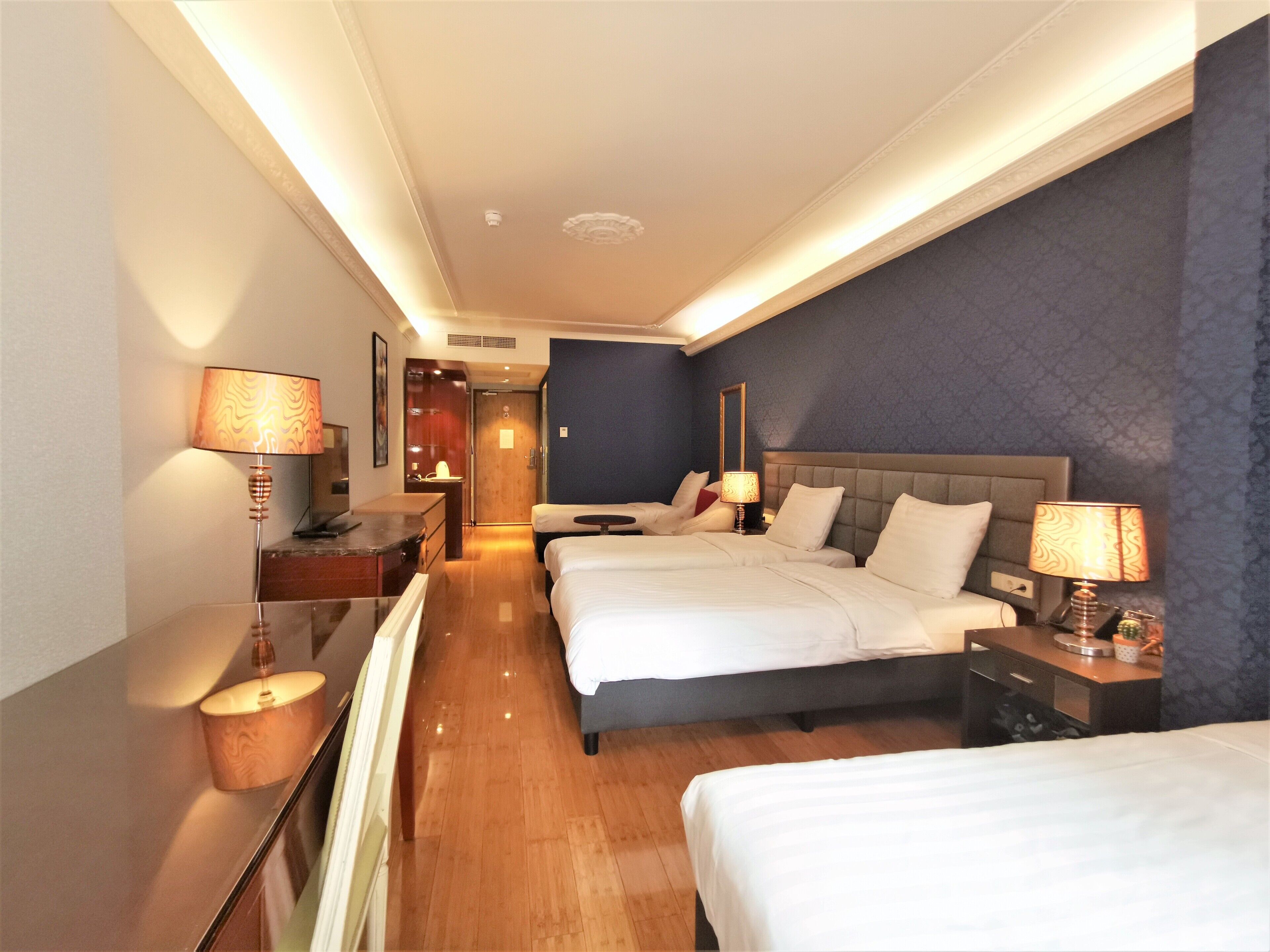 superior quadruple room, patio | in-room safe, individually decorated, individually furnished, desk