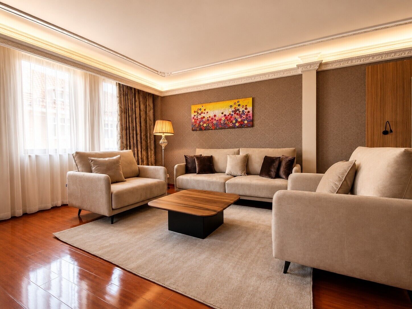 A modern living room with two sofas, a coffee table, and a lamp.