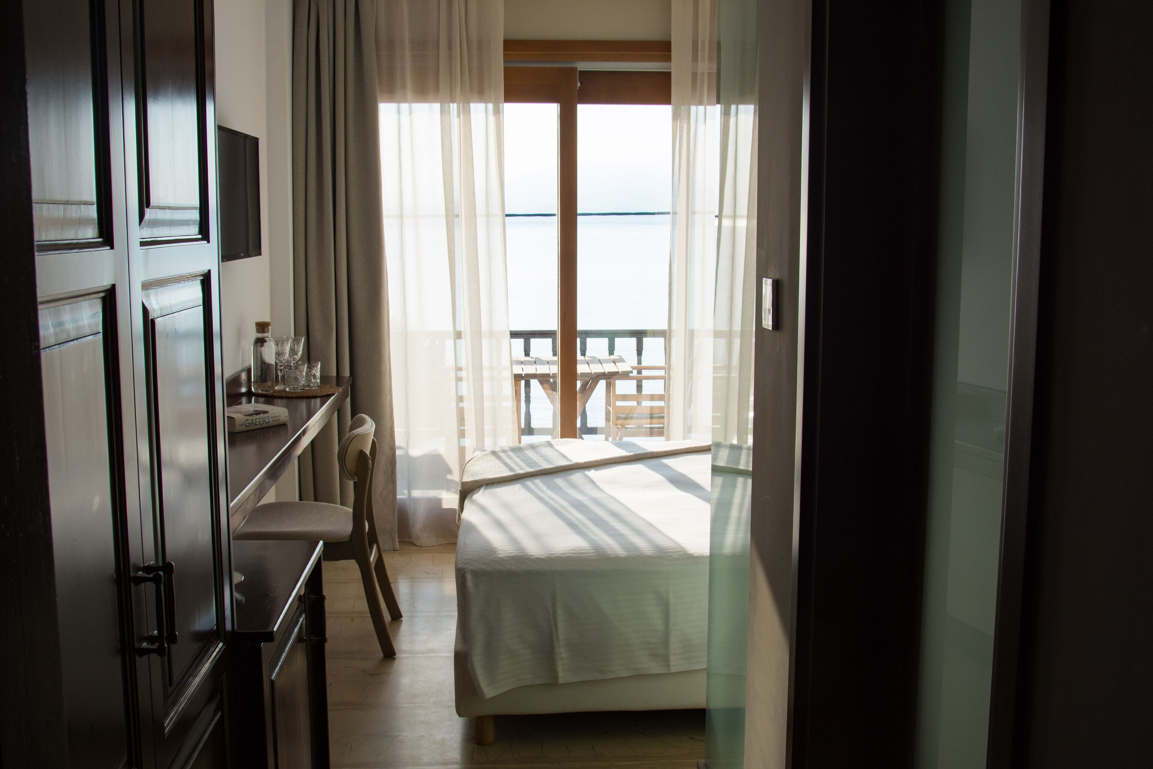 deluxe room, sea view | 1 bedroom, premium bedding, memory-foam beds, minibar