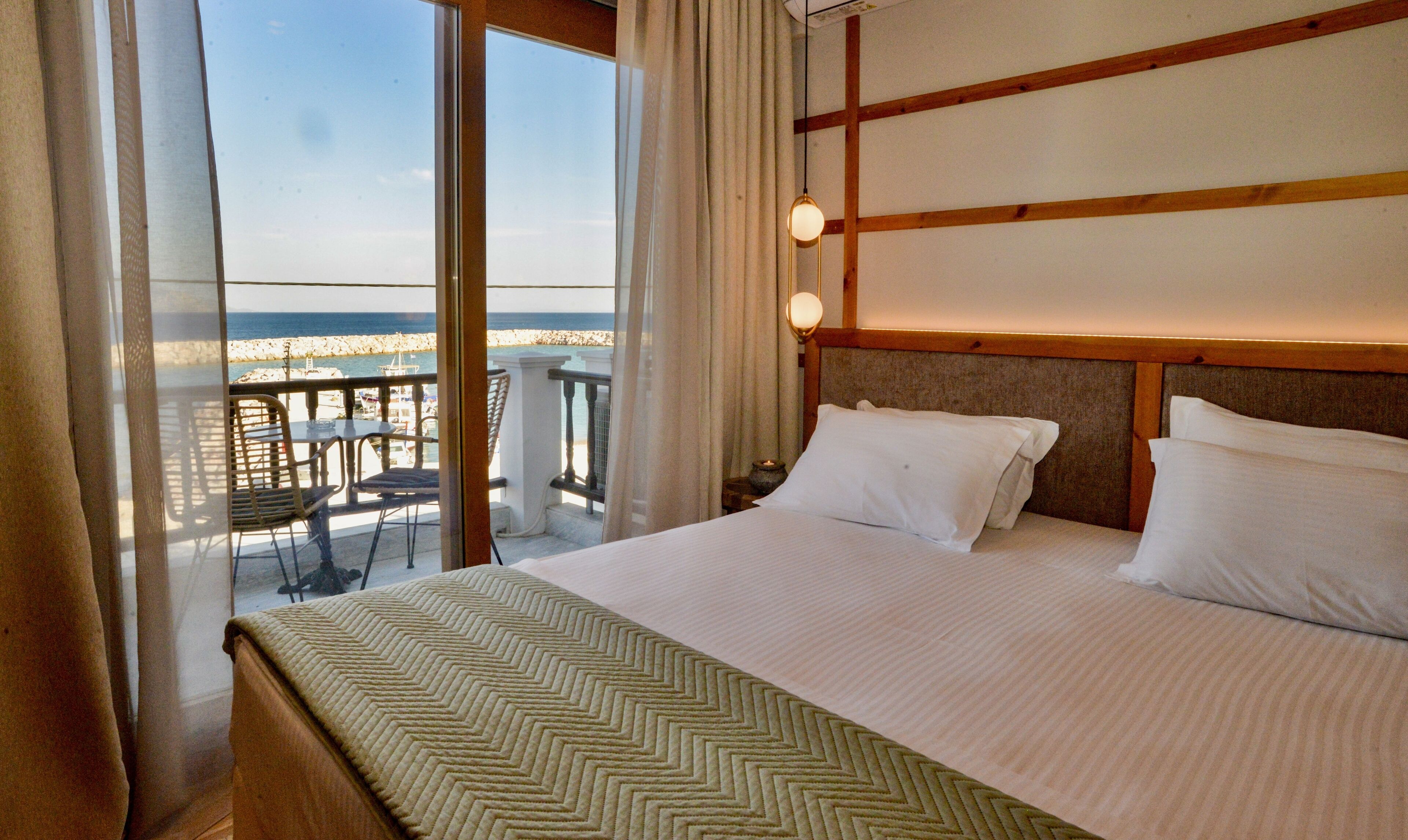 deluxe room, sea view | 1 bedroom, premium bedding, memory-foam beds, minibar