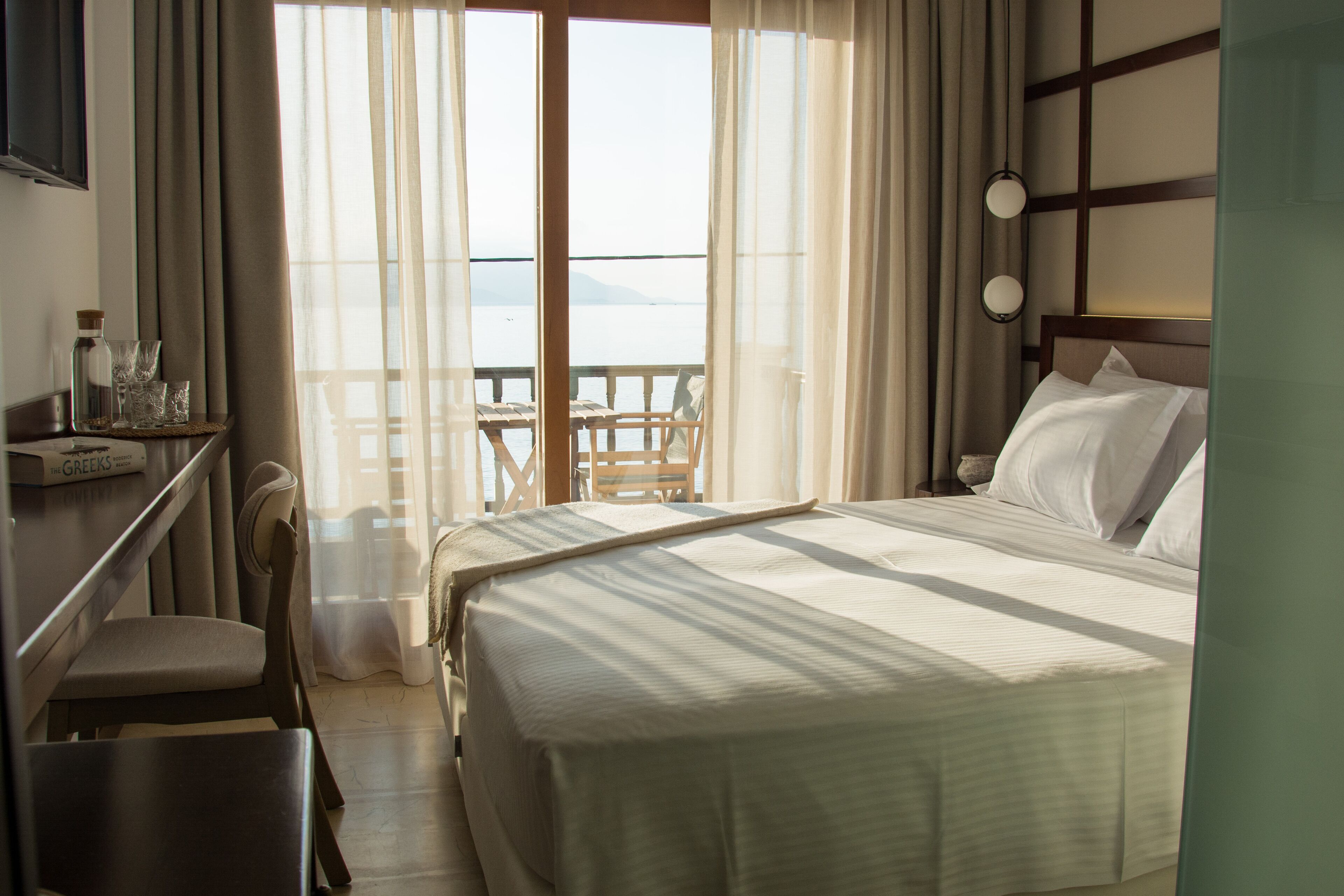 deluxe room, sea view | 1 bedroom, premium bedding, memory-foam beds, minibar
