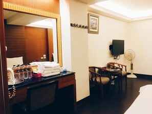 Family Quadruple Room | Living area | LCD TV