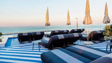 Indoor pool, outdoor pool, free pool cabanas, pool umbrellas