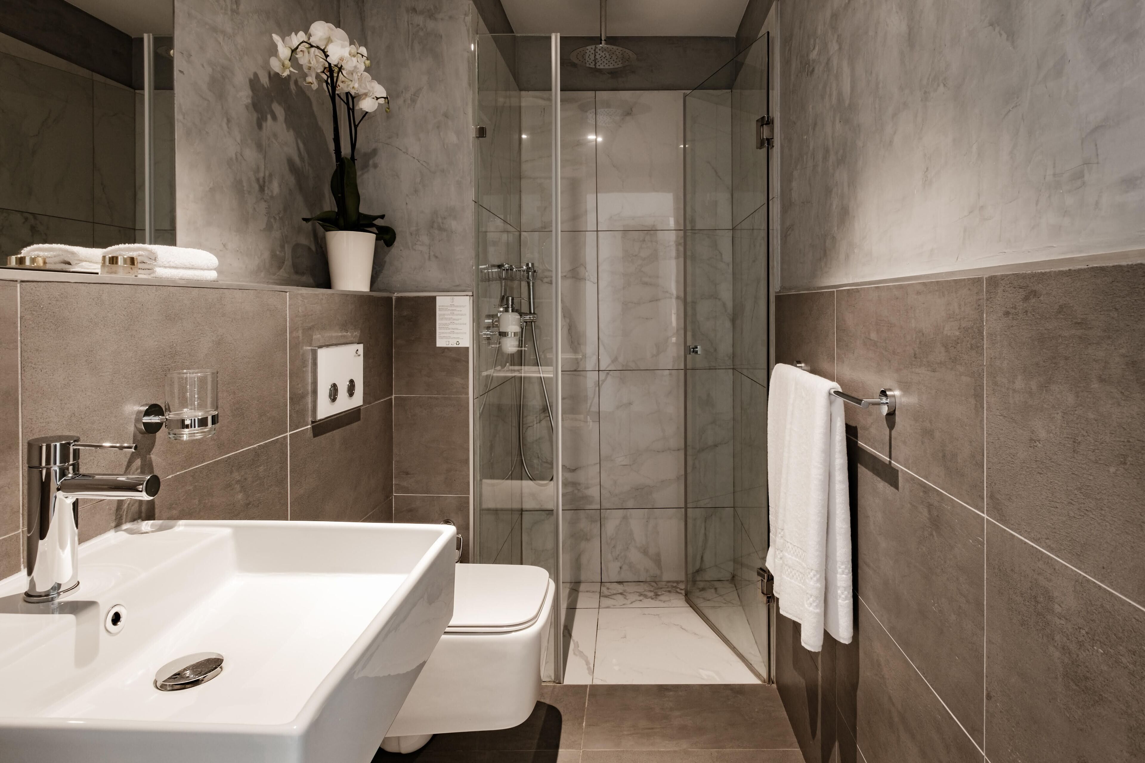 standard double or twin room | bathroom | shower, eco-friendly toiletries, hair dryer, bathrobes