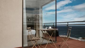 Signature suite, uitzicht op zee | Uitzicht vanuit de kamer