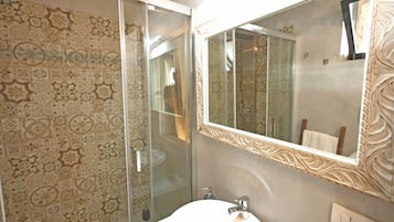 Shower, free toiletries, hair dryer, bathrobes