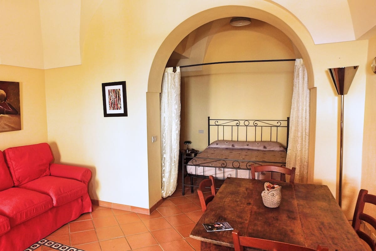 Apartment, 1 Bedroom (Dammuso Rosso) | Premium bedding, desk, iron/ironing board, free WiFi
