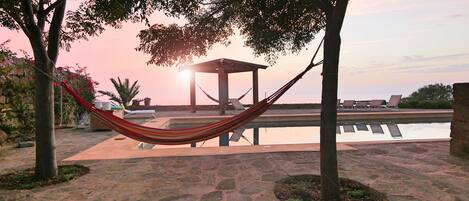 Outdoor pool, pool umbrellas, sun loungers