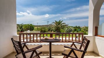Triple Room, Garden View | Terrace/patio