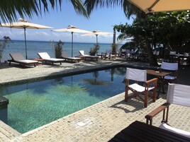 Outdoor pool, pool umbrellas, sun loungers
