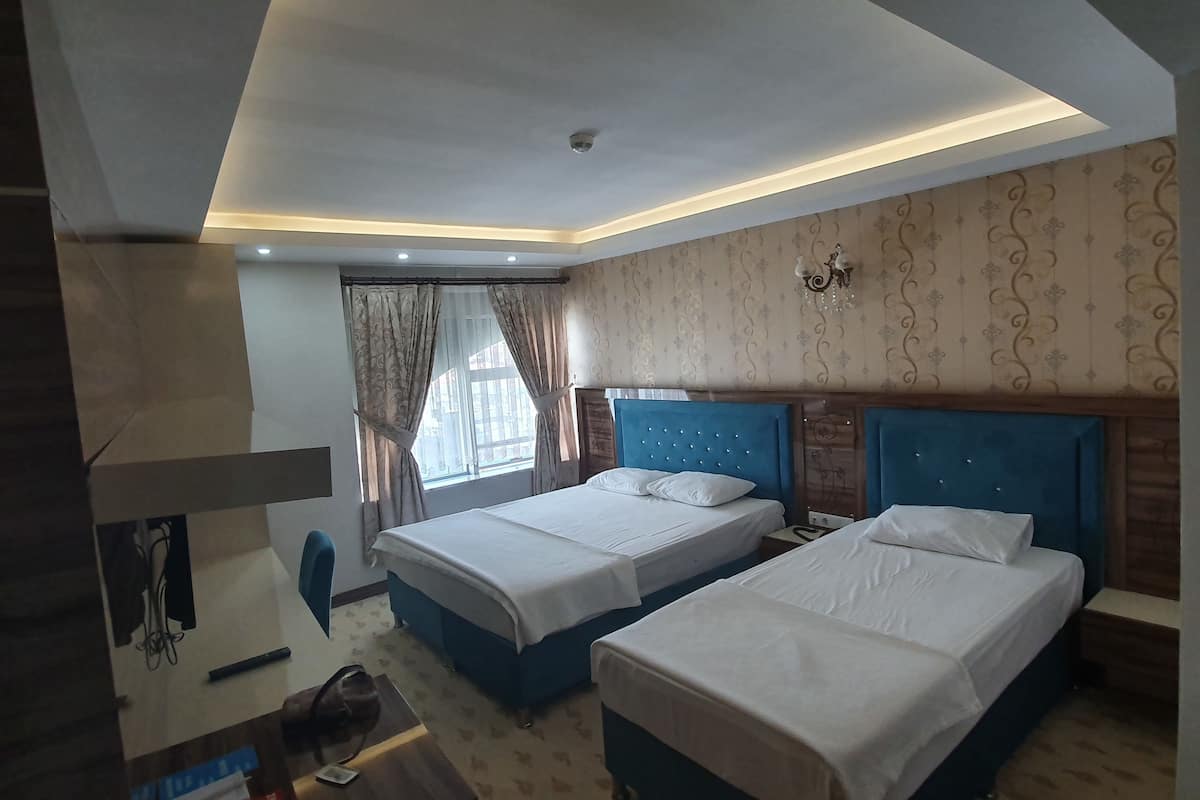 family triple room | minibar, in-room safe, desk, soundproofing