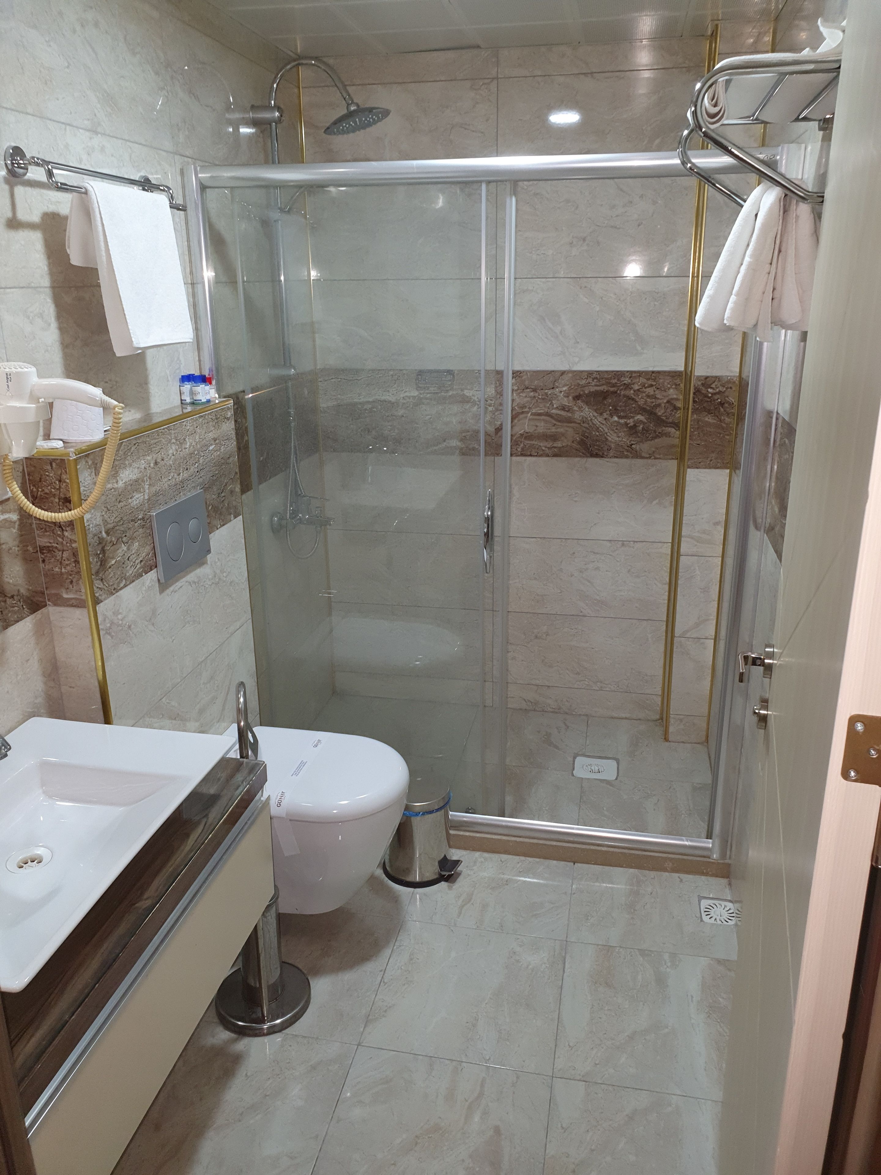 shower, free toiletries, hair dryer, dressing gowns