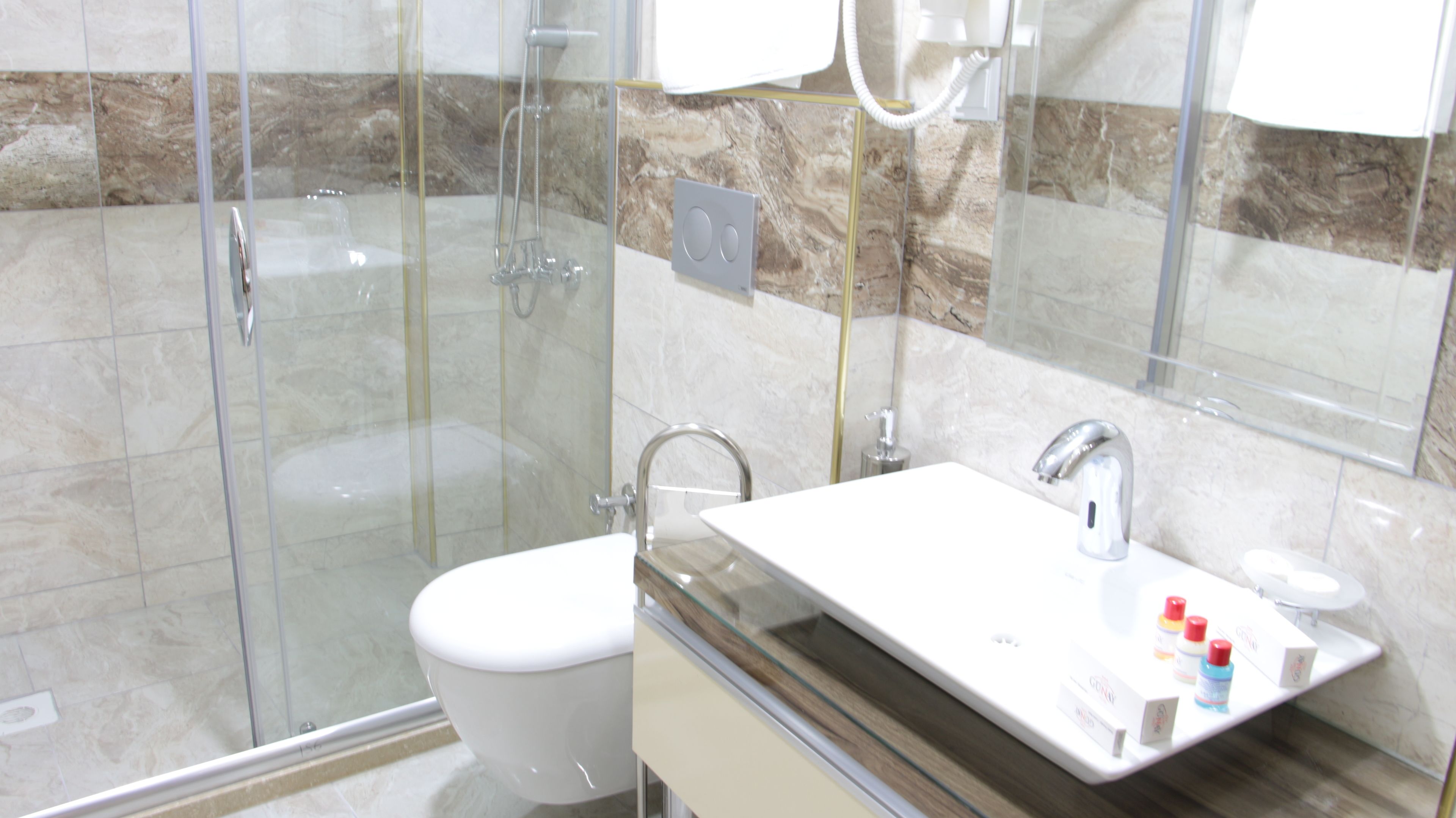 shower, free toiletries, hair dryer, dressing gowns