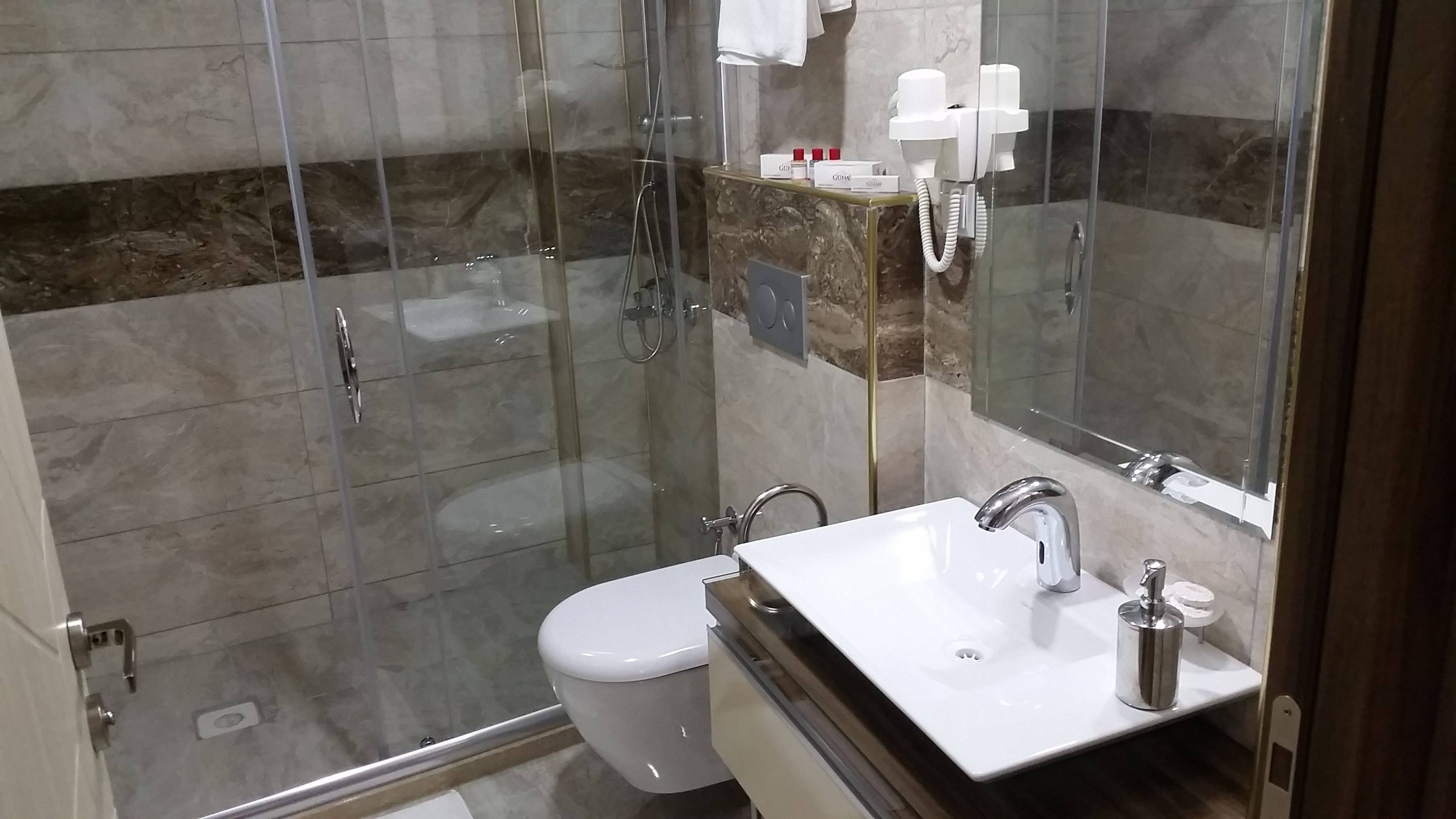 shower, free toiletries, hair dryer, dressing gowns