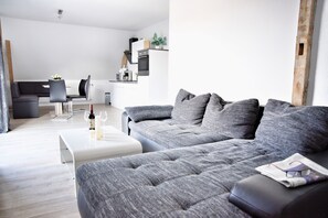 Family Apartment, 2 Bedrooms, Non Smoking, Terrace | Living area | Flat-screen TV - Haff-Ostseeferienhaus (Monkebude)