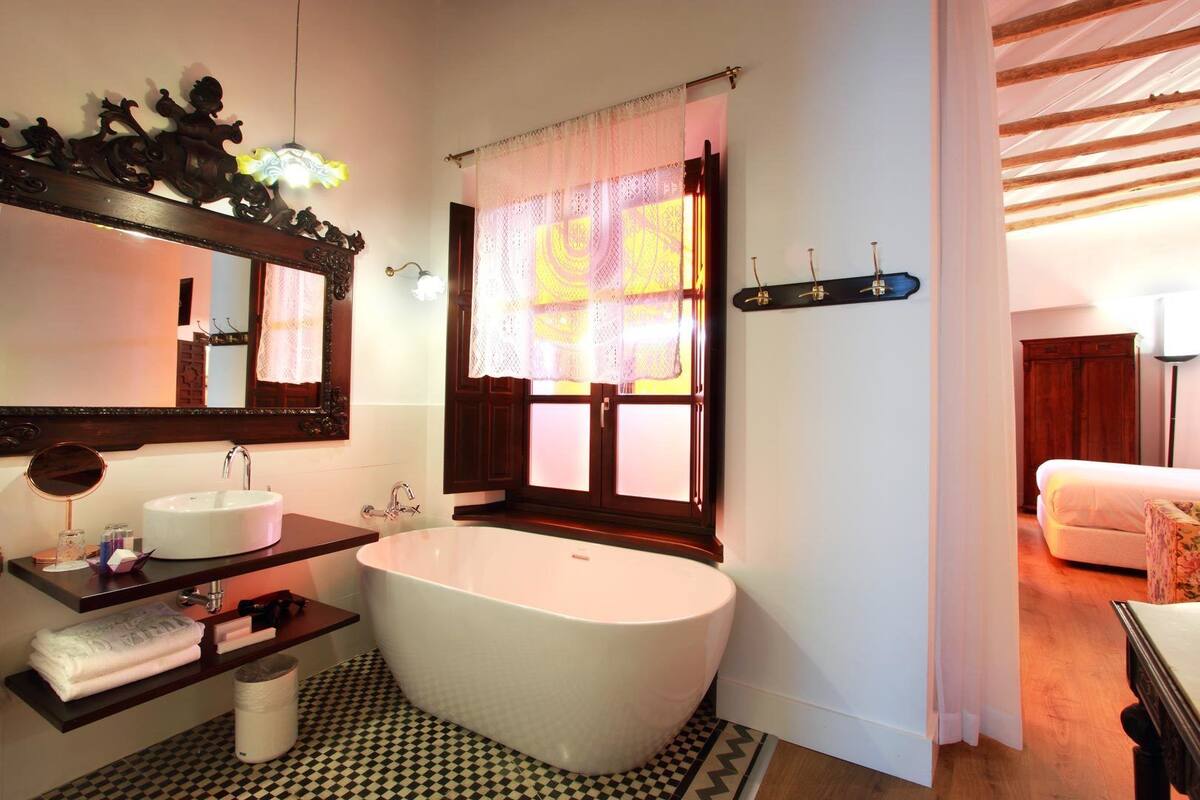 superior double room | bathroom | free toiletries, hair dryer, towels