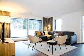 Apartment | Living area | Flat-screen TV - Apartment Rugenpark 6 (Interlaken)