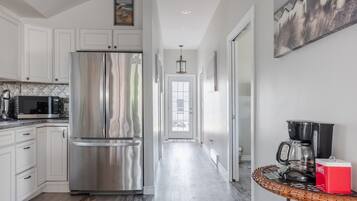 Cottage, 2 Bedrooms | Private kitchen | Full-sized fridge, microwave, oven, dishwasher