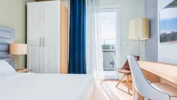 Suite | Caja fuerte, escritorio, cortinas opacas y sistema de insonorización