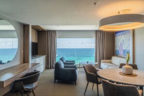 Executive Suite, 2 Bedrooms, Balcony | Living area | 43-inch flat-screen TV with satellite channels, TV