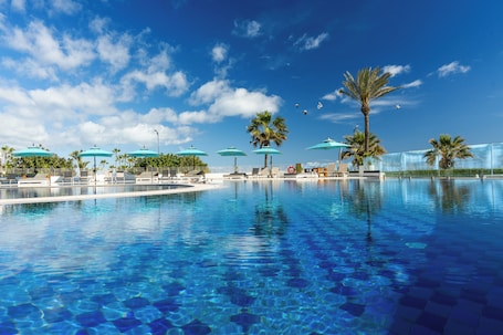 Indoor pool, 2 outdoor pools, pool umbrellas, sun loungers